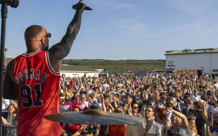 The view from the music stage across the crowd at a sunny Ffos Las